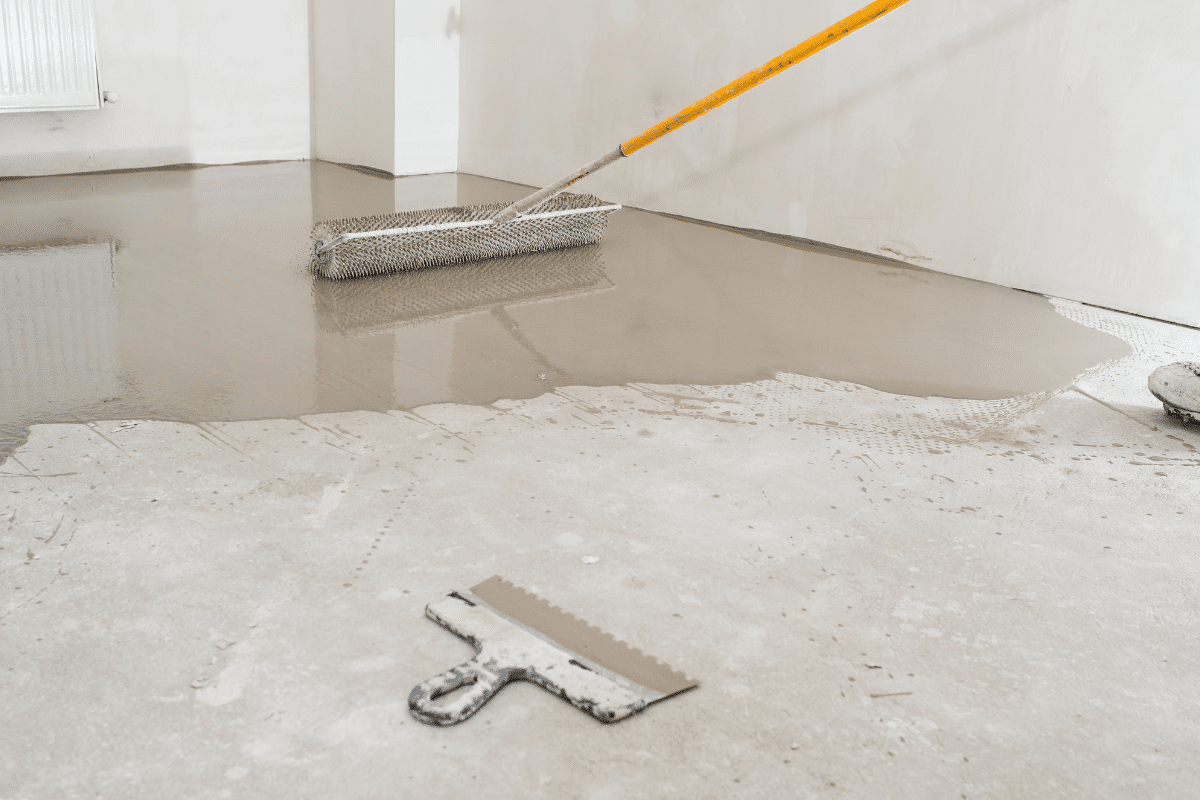 Man pouring concrete mix using a pump